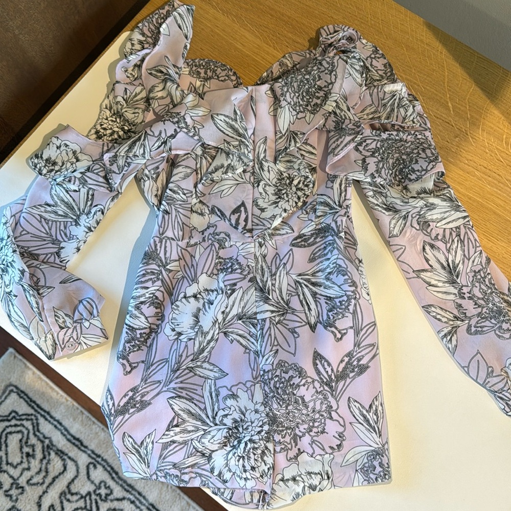 Stunning silk romper hundred percent polyester worn one snow returns